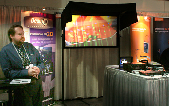 Lightspeed's President Chris Ward with the new DepthQ HDs3D2 projector, combined with the DepthQ Polarization Modulator and a Stewart silver 3D screen at Siggraph 2010